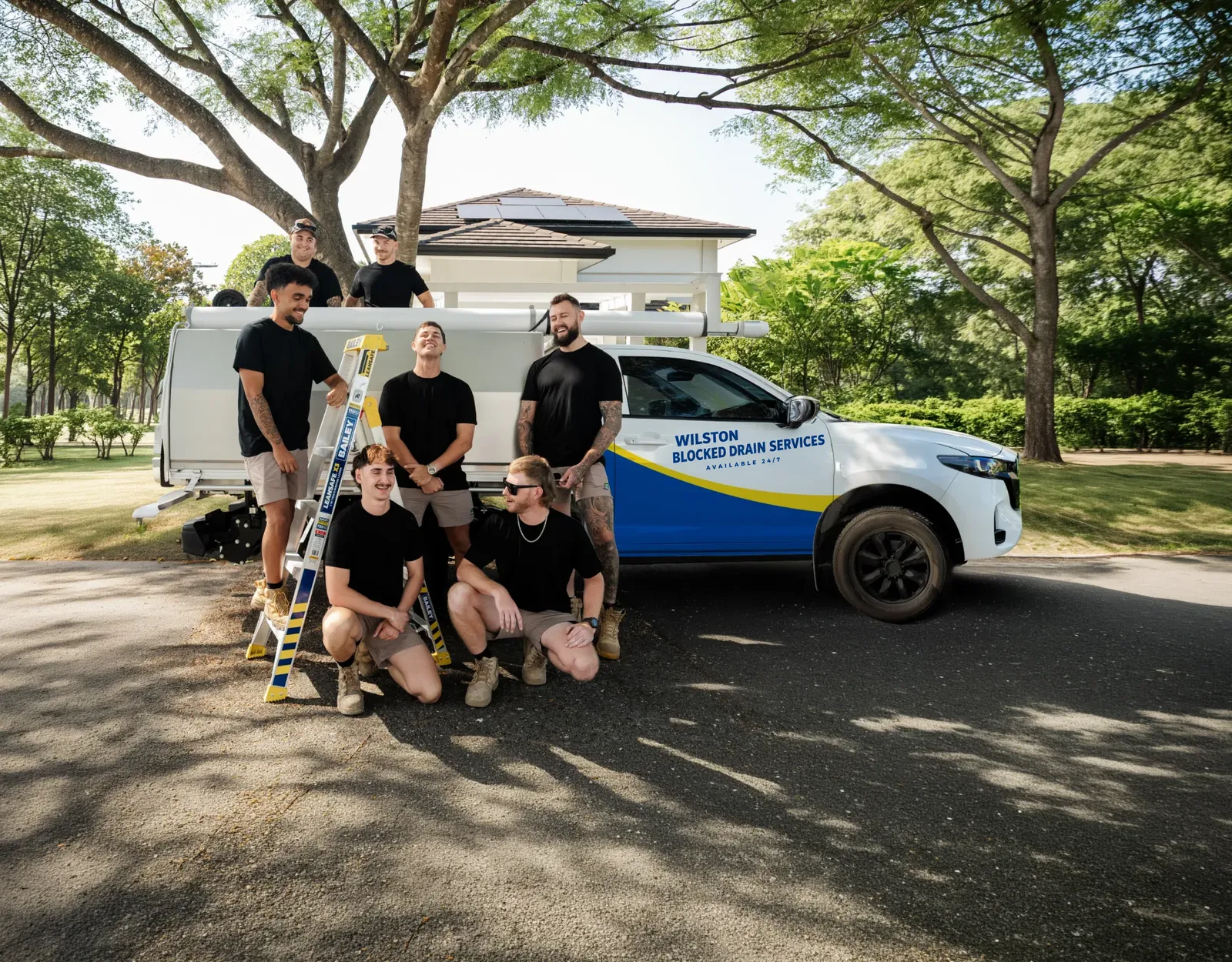Wilston Blocked Drain Services ute and team